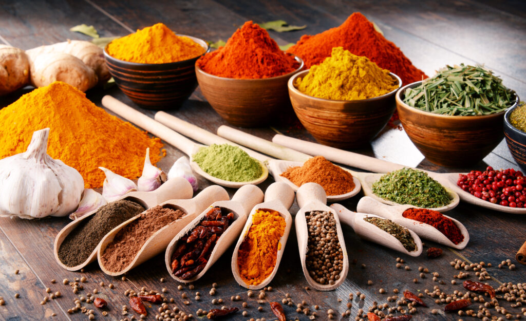 variety of spices and herbs on kitchen table