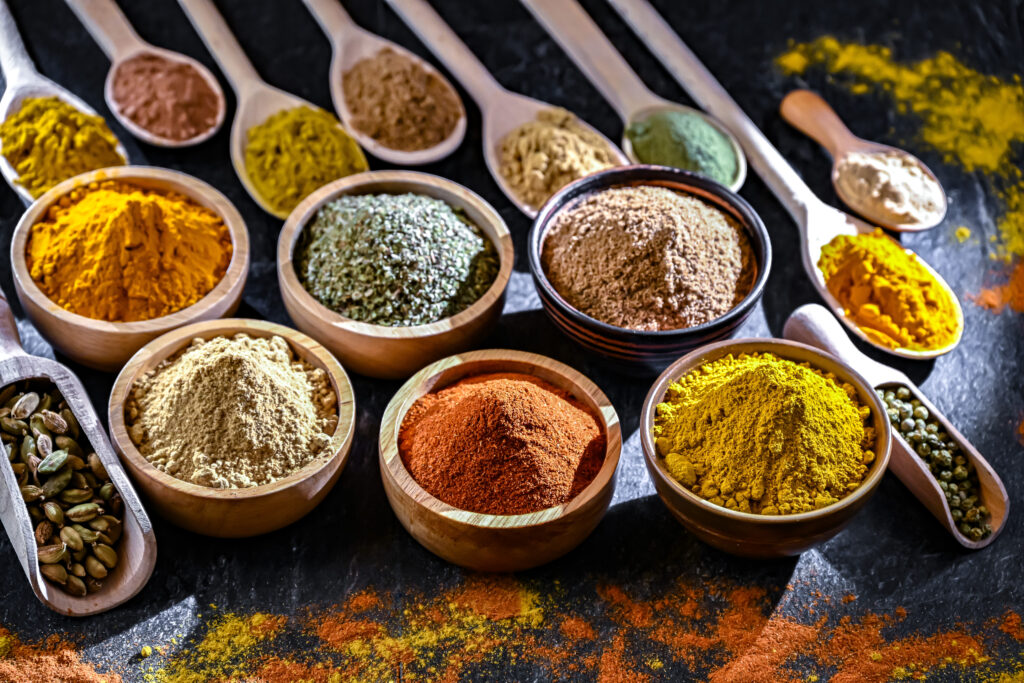 Burdock Root Benefits, Tea, Recipes, and Safety composition with assortment of spices and herbs